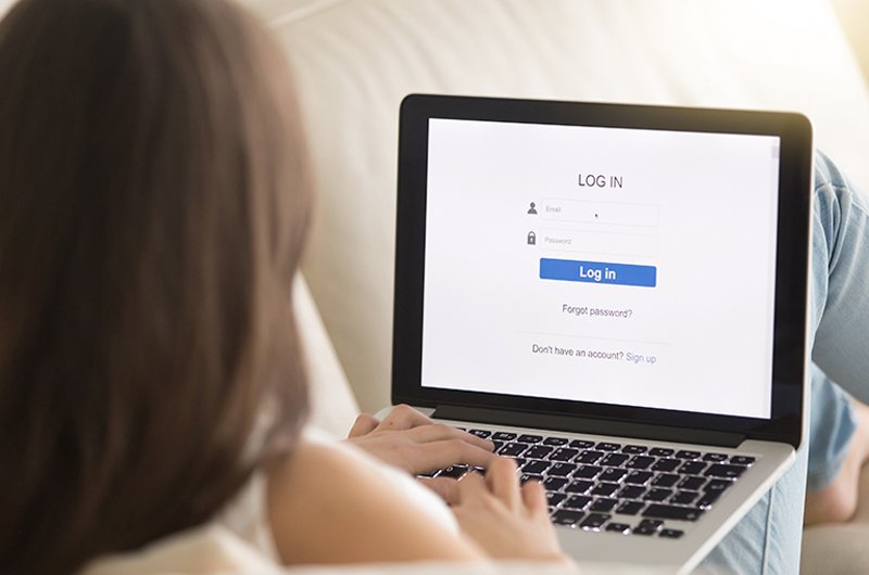 Woman logging on to a secure website